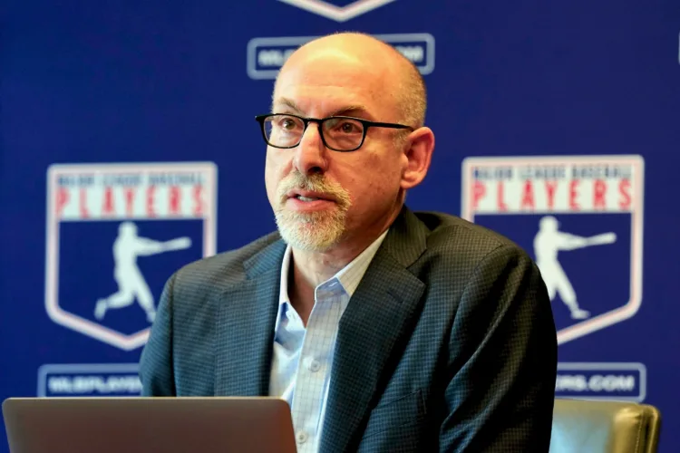 Baseball union head criticizes MLB salary cap ad campaign